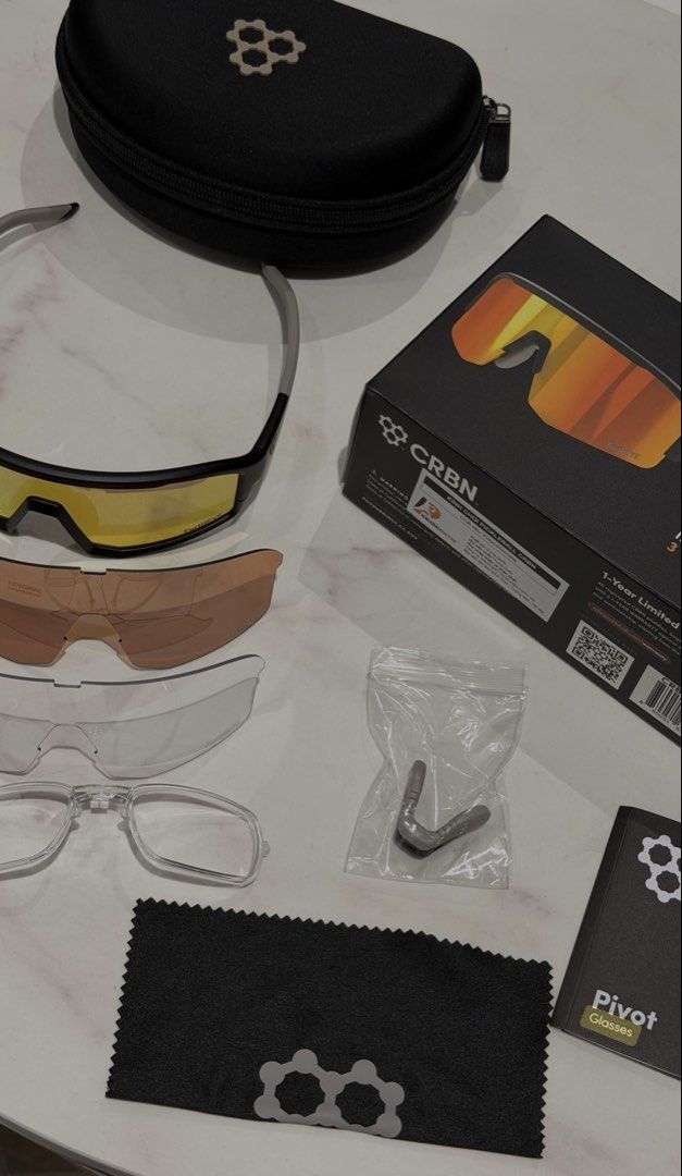 CRBN Pivot Interchangeable Lens System Sunglasses (Category: Sunglasses & Eyewear) located in Quezon City. Submitted by LovedByAna_ (Listing ID 1463036110, Image 1). Description: - CRBN Pivot sunglasses with interchangeable lens system - Includes yellow, brown, and clear lenses - Comes with protective case, cleaning cloth, and extra nose piece - Ideal for various sports and outdoor activities - Original box and manual included.