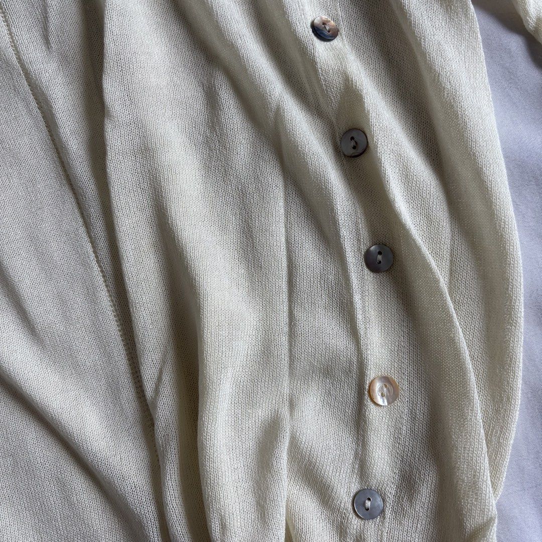 Cream Knit Long Sleeve Top with Shell Buttons (Category: Longsleeves) located in Quezon City. Submitted by yamakento (Listing ID 1462944105, Image 3). Description: fits s-m, loose silhouette.