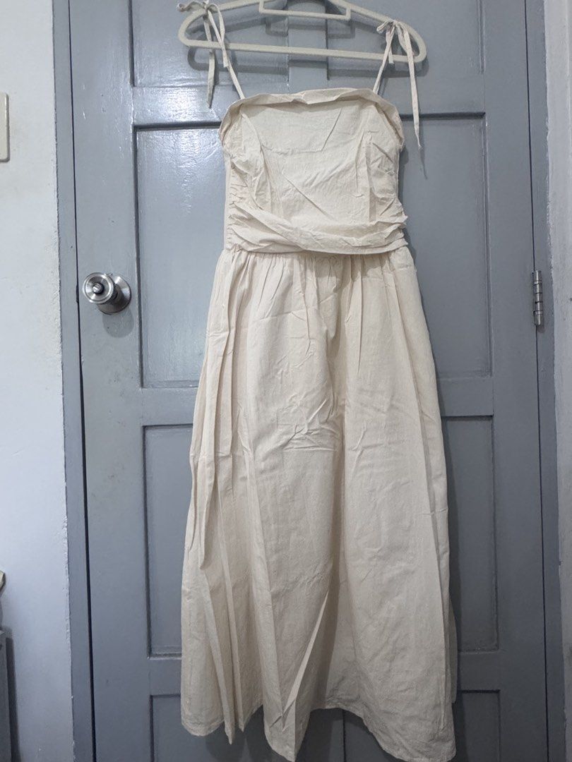 CREAM LONG TIE STRAP DRESS (Category: Dresses) located in Makati City. Submitted by sassywear.ph (Listing ID 1463016898, Image 1). Description: Can fit small-medium, like new condition. .