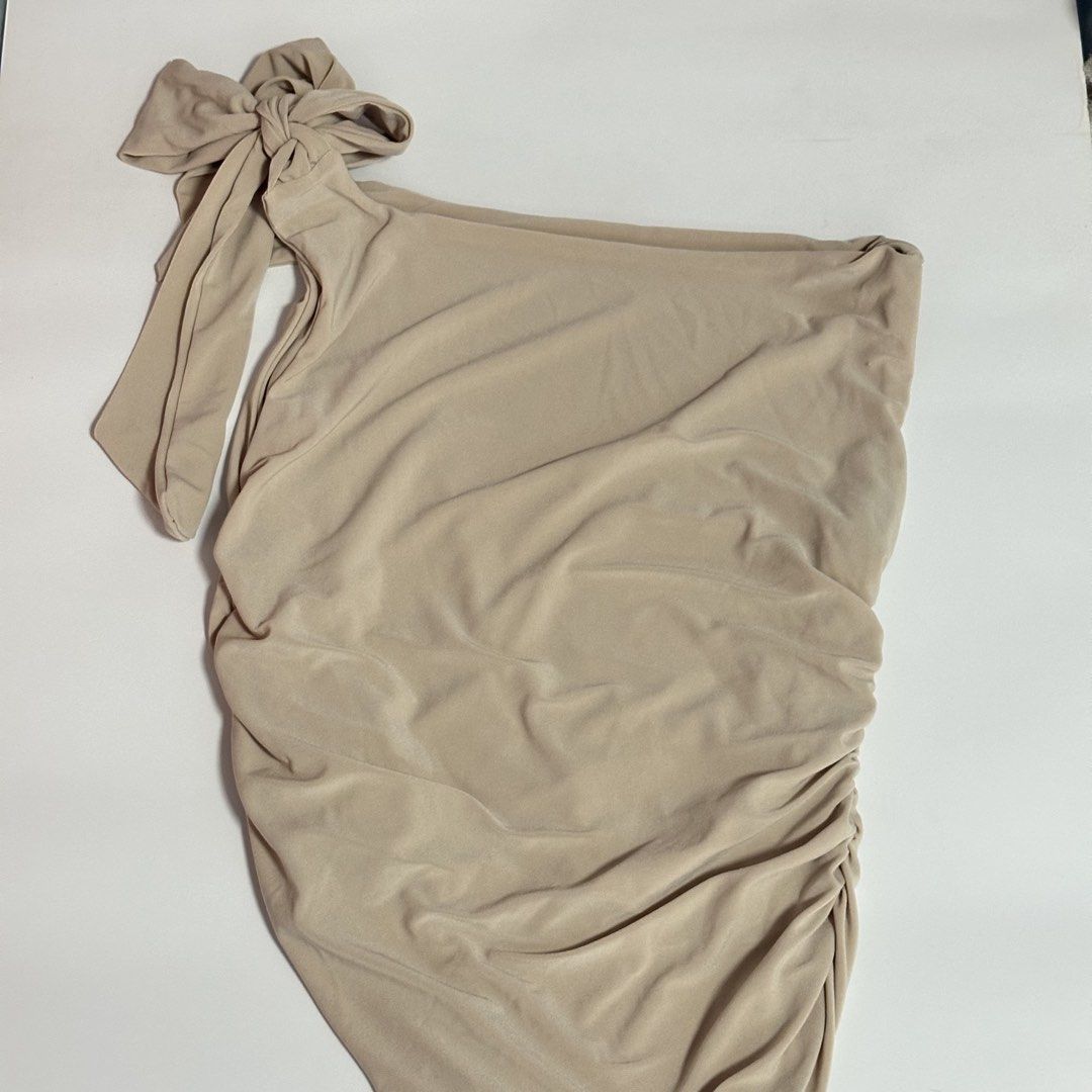 Cream One Shoulder Ruched Tie Top (Category: Sleeveless) located in Quezon City. Submitted by gg.finds (Listing ID 1462942998, Image 2). Description: - new, only worn once for an event - double lining, comfy fabric material - one shoulder tie top, ruched, stretchable - size fits Small to Medium - color is Cream / Beige - rfs: decluttering.