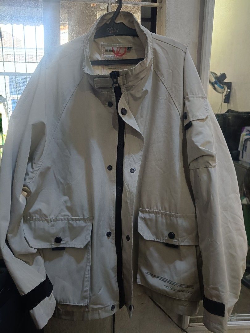 CREAM WINDBREAKER (Category: Coats, Jackets and Outerwear) located in Santa Rosa. Submitted by basmayorsh99139 (Listing ID 1463064259, Image 1). Description: - Cool beige jacket from BEEDY V-Line - Zip-up front with button closures - Multiple front pockets - Lined interior with an inner pocket - Unique design, great for layering - MEDIUM TO LARGE.