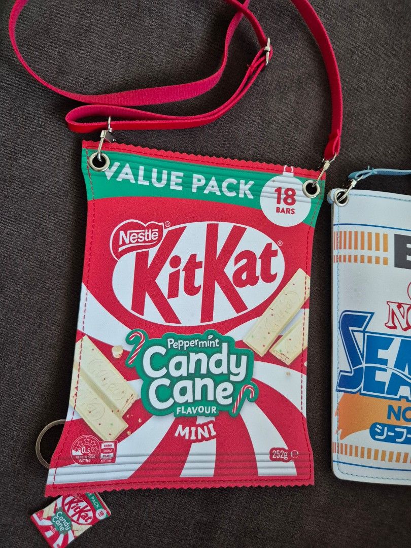 SET Creative Unique BKK Kitkat Cup Noodles Sling bag (Category: Cross-body Bags) located in Makati City. Submitted by nkris07 (Listing ID 1462949486, Image 3). Description: Sold as pair ❤️ cute creative sling bags Kitkat & Nissin Cup Noodles with long straps fits phone, make up, tissue etc..spacious very handy.