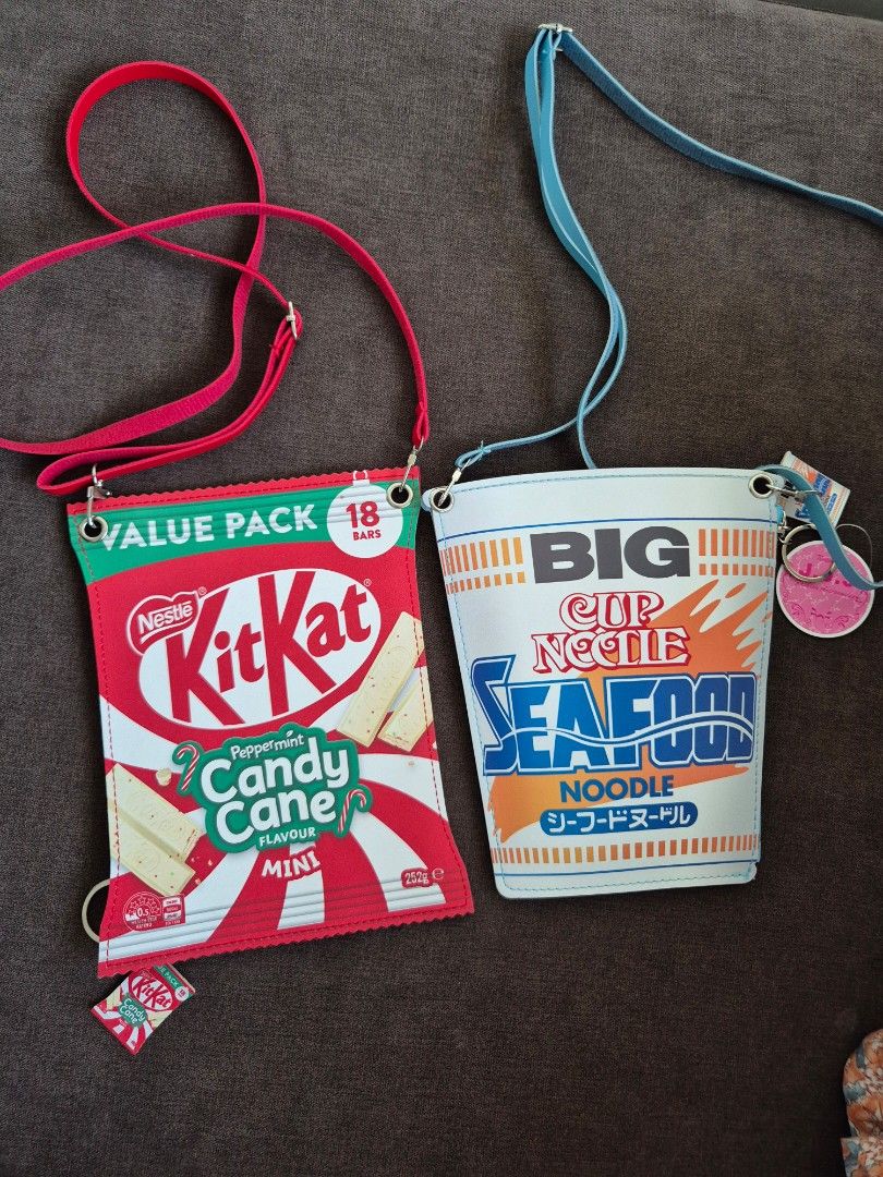 SET Creative Unique BKK Kitkat Cup Noodles Sling bag (Category: Cross-body Bags) located in Makati City. Submitted by nkris07 (Listing ID 1462949486, Image 2). Description: Sold as pair ❤️ cute creative sling bags Kitkat & Nissin Cup Noodles with long straps fits phone, make up, tissue etc..spacious very handy.