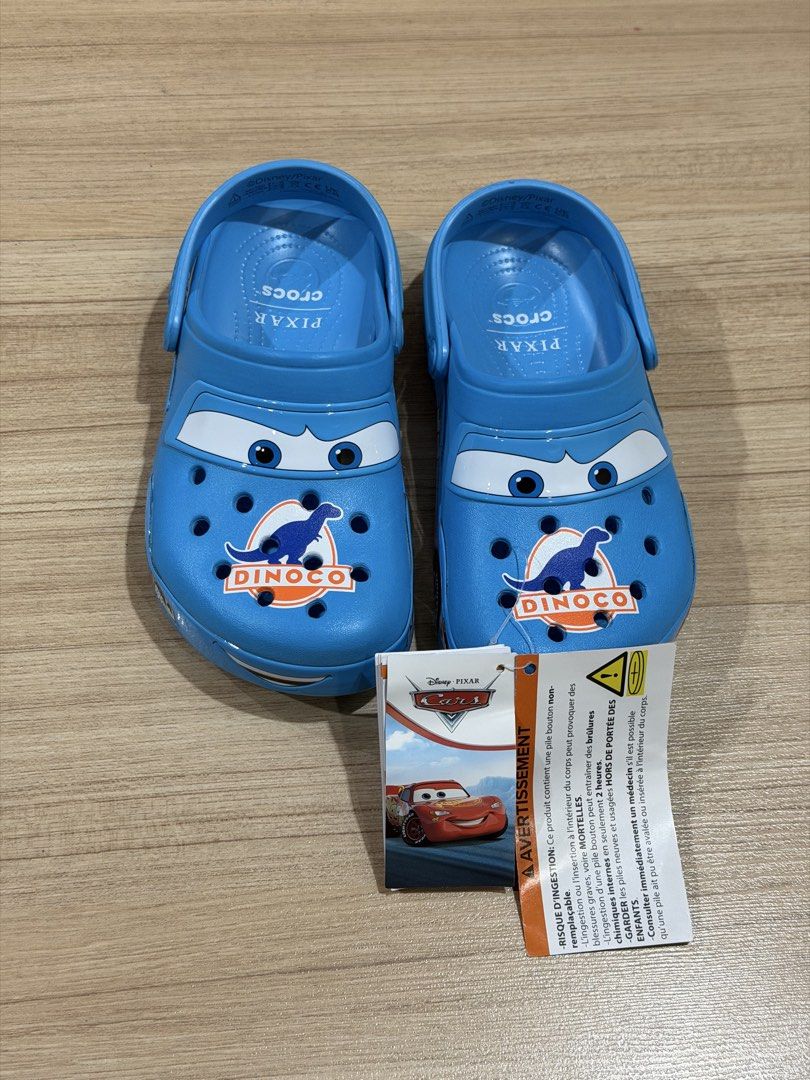 Crocs Cars Dinoco J3 (Category: Babies & Kids Fashion) located in Paranaque City. Submitted by shop.baesic (Listing ID 1462991140, Image 2). Description: Bought Sept 20 in CROCS NORTH EDSA Fitted only RFS - wrong size Tags in tact & crocs eco bag Receipt if needed.