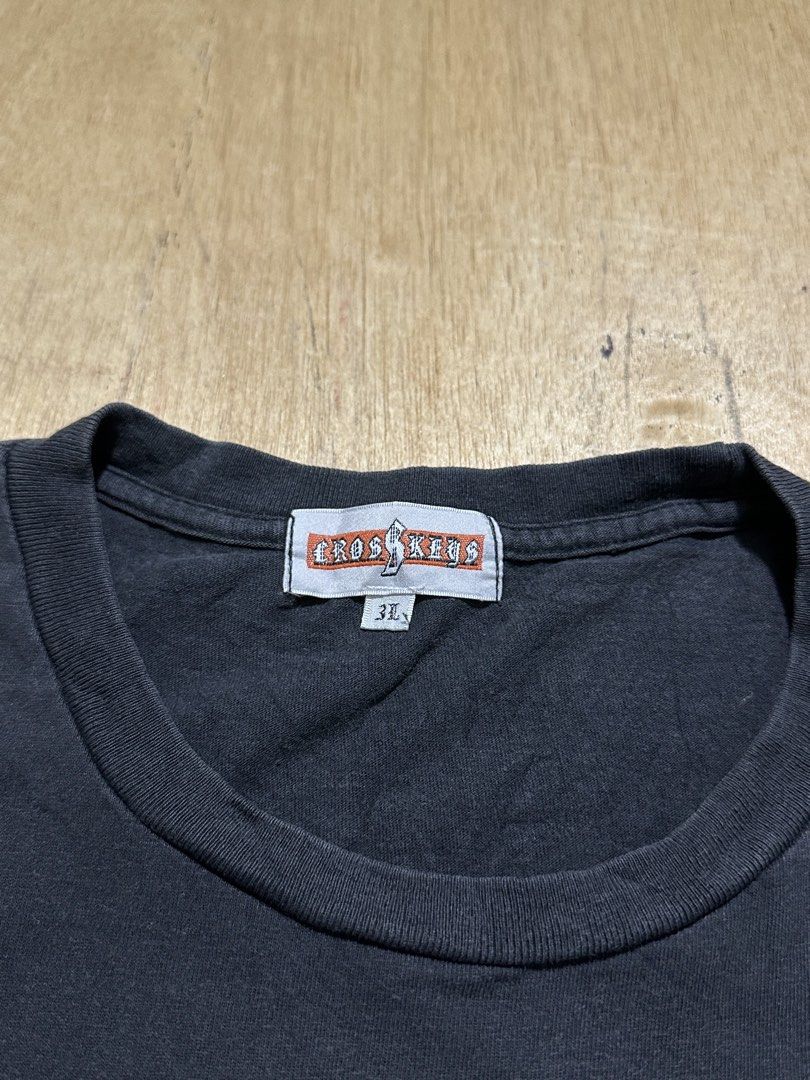 Cross Keys Y2K Shirt (Category: Tshirts & Polo Shirts ) located in Bacolod City. Submitted by dannnsoy (Listing ID 1462908758, Image 3). Description: Cross Keys Y2K Shirt •In good condition •Dimension: 24” x 27.5” •Issue: Fades and crack prints •Price: 799 only 📍Note: Color may vary to due lighting and camera resolution. .