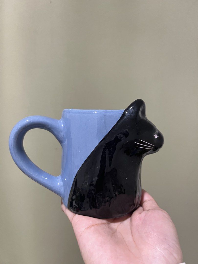 Cute Black Cat Blue Ceramic Mug (Category: Coffee & Tea Tableware) located in Manila. Submitted by vaughnscloset (Listing ID 1463043274, Image 1). Description: .