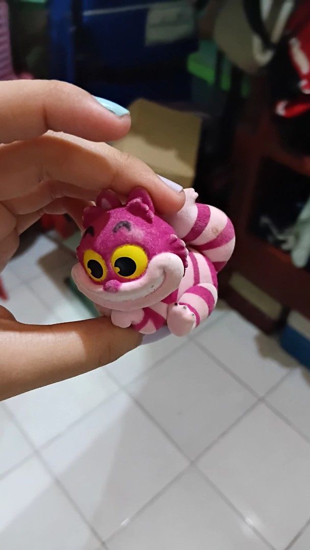 Cute Cheshire Cat Toy Figure (Category: Figurines & Statues) located in Abucay. Submitted by jium313 (Listing ID 1463034583, Image 1). Description: -MOP: Gcash - missing bed and mushroom accessories -a few balding spots of the synthetic fur -rsf: financial issues .