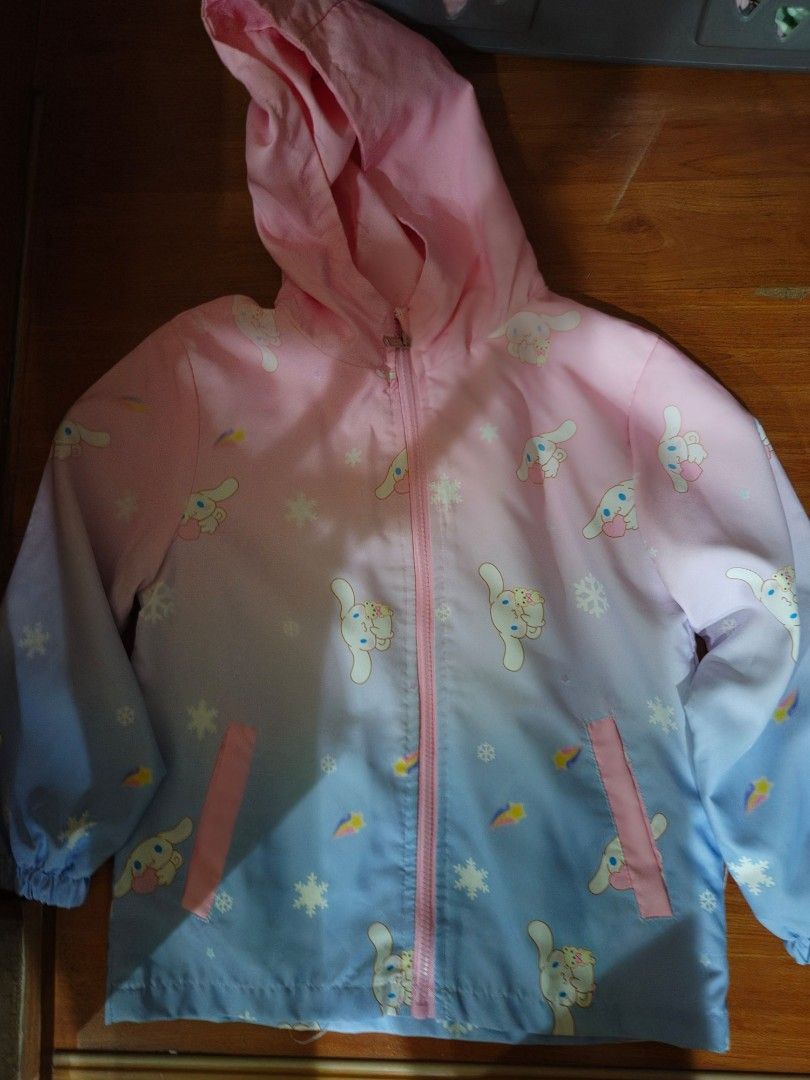 Cute Cinnamoroll Gradient Pink Blue Zip-Up Jacket (Category: Coats, Jackets and Outerwear) located in Quezon City. Submitted by flowercharm (Listing ID 1463019169, Image 2). Description: - Adorable Cinnamoroll print jacket for 6 to 8 year old - Beautiful pink to blue gradient design - Features cute snowflake and ice cream cone details - Two front pockets with stylish pink trim - Elastic cuffs for a comfortable fit - Ideal for casual outings or as