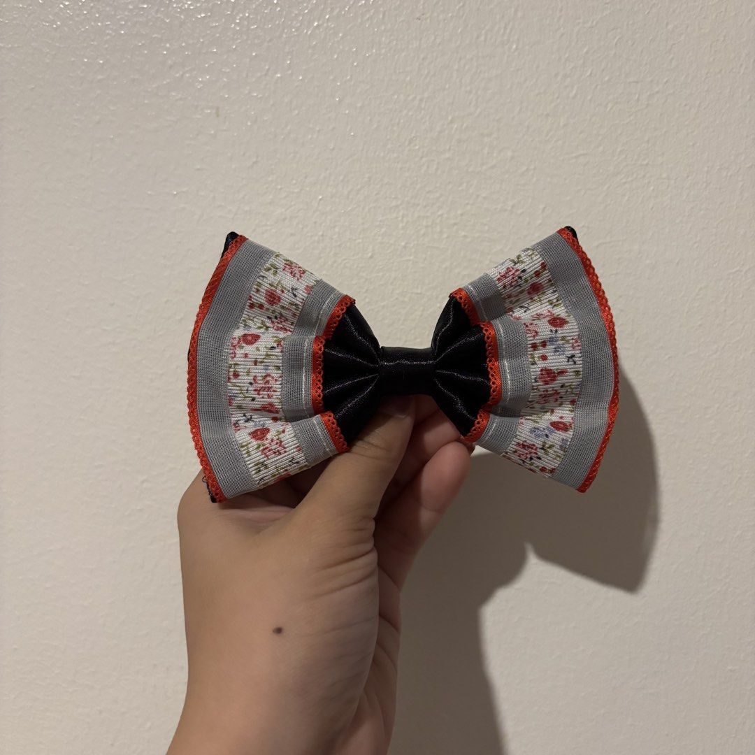 Cute Hair Clips & Bows Set - Various Designs (Category: Hair Accessories) located in Manila. Submitted by robbyrabbit (Listing ID 1462922509, Image 2). Description: - Set of cute hair accessories perfect for kids or anyone who loves adorable styles. - Includes floral bows with red, grey, and blue trim. - Features two pink cloud-shaped snap clips with My Melody. - Comes with two dusty rose flower clips and a matching bow..