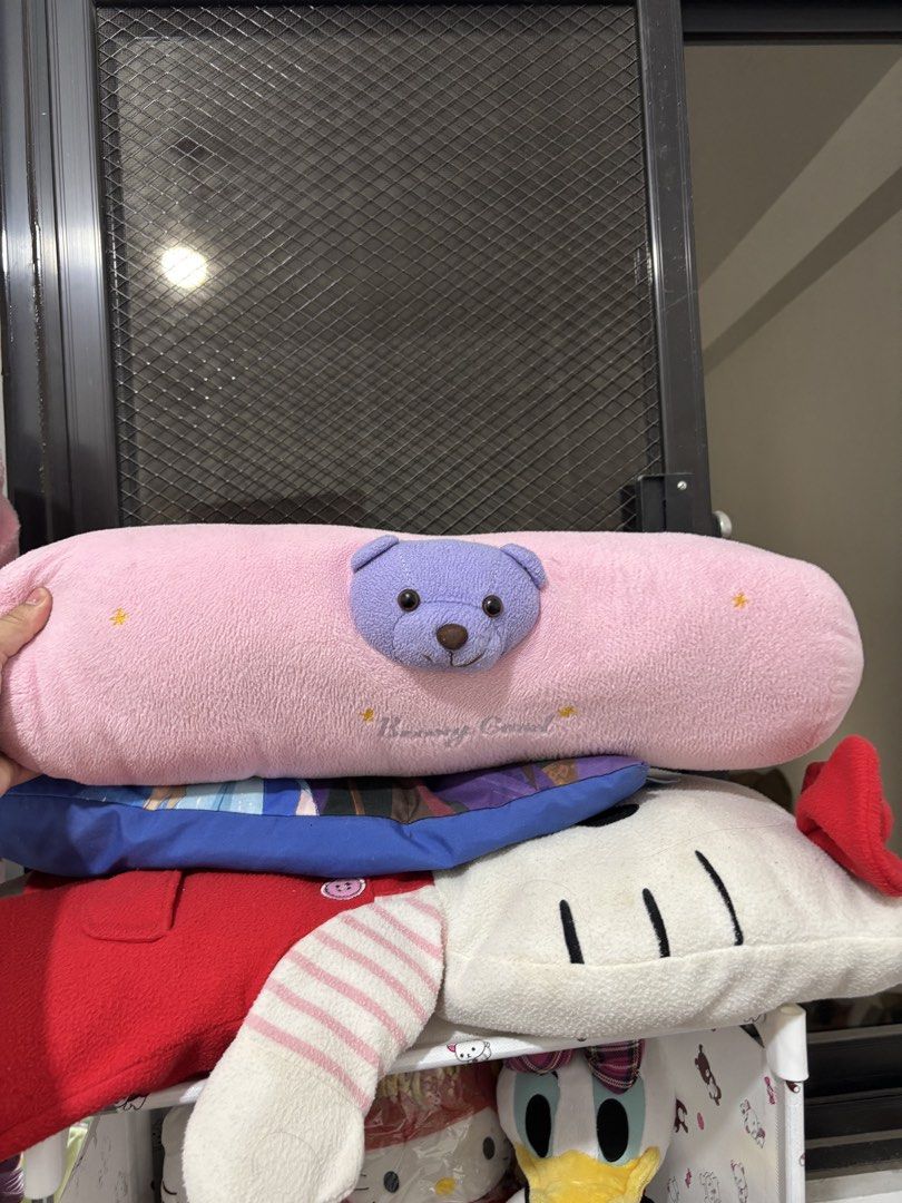 Cute Plush Pillows - Bear, Frozen, Flower (Category: Plushies & Soft Toys) located in Manila. Submitted by robbyrabbit (Listing ID 1462921580, Image 1). Description: - Bundle of 3 cute plush pillows - Includes a long pink pillow with a purple bear face - Rectangular pillow featuring Elsa and Anna from Frozen - Soft flower-shaped pillow in pink and yellow - Perfect for decoration or cuddling - All items are clean and well-kept.