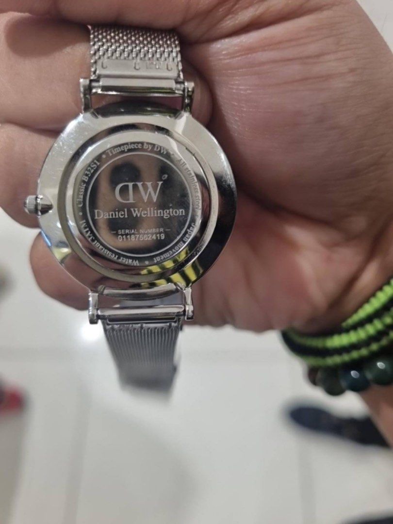 Daniel Wellington Classic B32S1 Mesh Strap Watch (Category: Women's Watches) located in Manila. Submitted by warmfalcon.d1e33c (Listing ID 1462927961, Image 2). Description: - Authentic Daniel Wellington B32S1 Watch - Elegant Silver Mesh Strap - Classic White Dial with Silver Hour Markers - Precise Japanese Quartz Movement - Water Resistant - Serial Number: 01197562419 - Timeless DW Design.