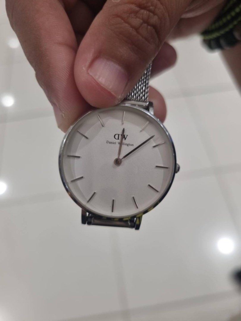 Daniel Wellington Classic B32S1 Mesh Strap Watch (Category: Women's Watches) located in Manila. Submitted by warmfalcon.d1e33c (Listing ID 1462927961, Image 1). Description: - Authentic Daniel Wellington B32S1 Watch - Elegant Silver Mesh Strap - Classic White Dial with Silver Hour Markers - Precise Japanese Quartz Movement - Water Resistant - Serial Number: 01197562419 - Timeless DW Design.