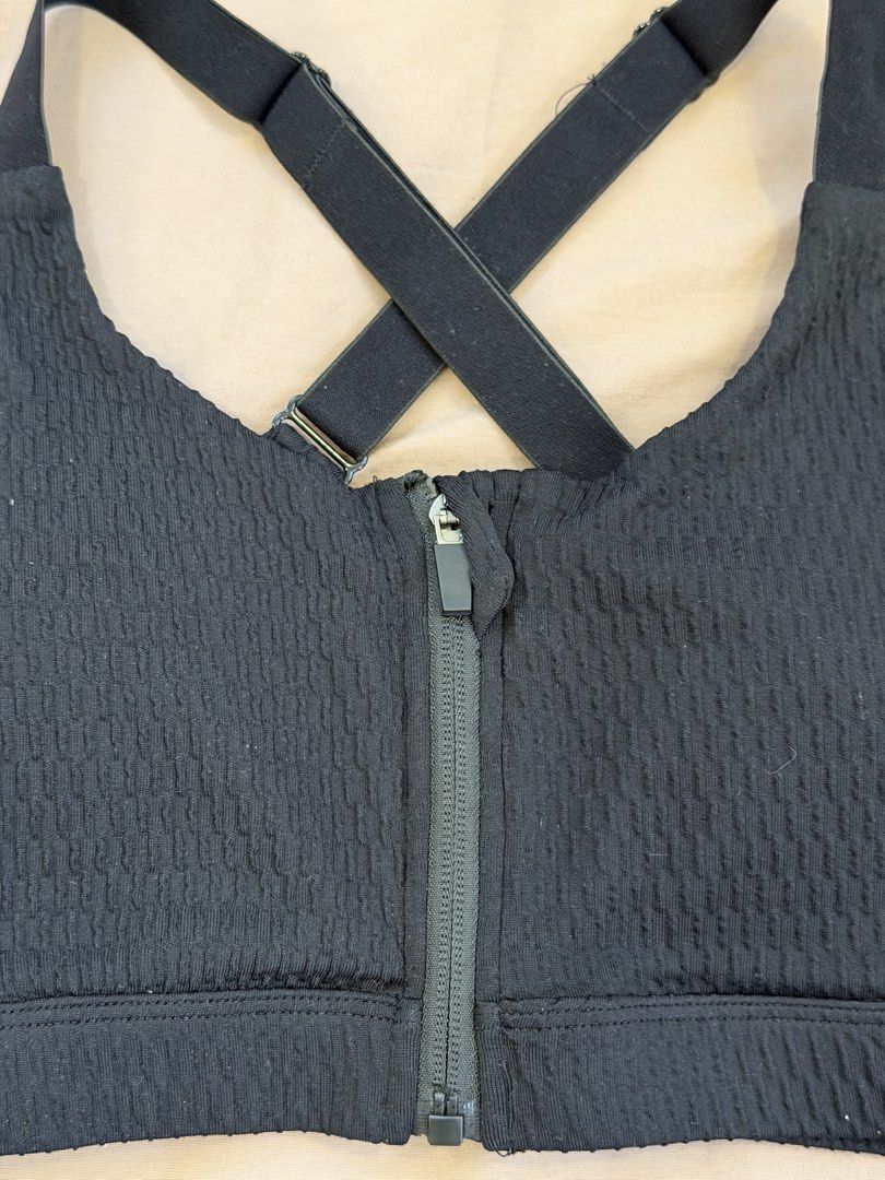 Danskin Black Textured Front Zip Sports Bra (Category: Activewear) located in Bulacan. Submitted by preloved_bygrace (Listing ID 1462985253, Image 3). Description: - Brand: Danskin - Color: Black - Material: Textured fabric - Closure: Front zip for easy wear - Straps: Criss-cross back design Note: Color may vary due to lighting. RFS: decluttering, need funds *Buyer shoulders the SF (J&T or Lalamove) **Can offer discounts if you get 2 or more item