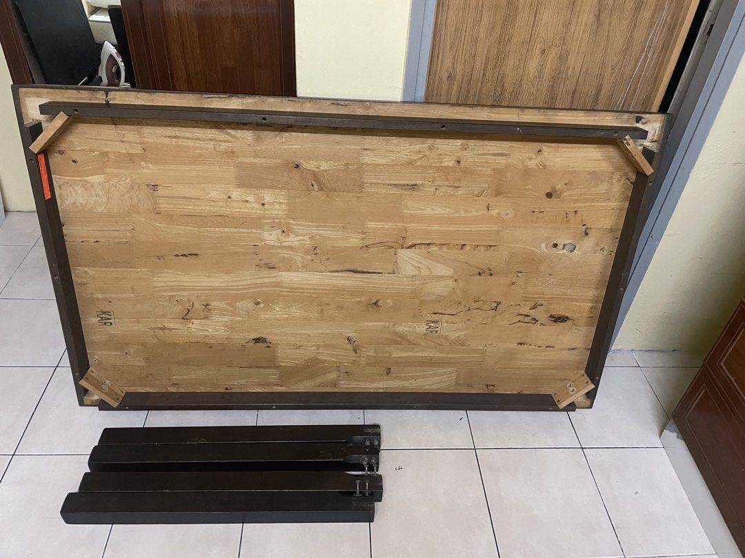 Dark Brown Rectangular Dining Table (Category: Tables & Sets) located in Shah Alam. Submitted by azwanazmer07957 (Listing ID 1461925252, Image 1). Description: - Dark brown solid wood table - Versatile: suitable for dining or as a work desk - Minor surface scratches from normal use - Boleh buka & pasang guna Allenkeys - Panjang: 4.75kaki - Lebar: 2.5kaki.