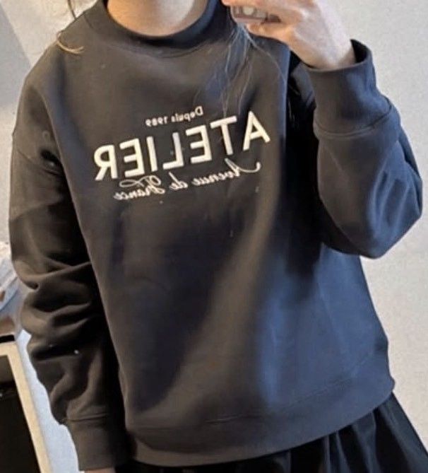 Dark Grey Atelier Sweatshirt with Text Print h&m (Category: Coats, Jackets and Outerwear) located in Manila. Submitted by catpanganiban_ (Listing ID 1462903997, Image 1). Description: - Dark grey sweatshirt - Features 'Atelier' and 'Avenue de France' text print - Crew neck, long sleeves - Comfortable and casual - Ideal for everyday wear - Versatile: pairs well with skirts or pants.