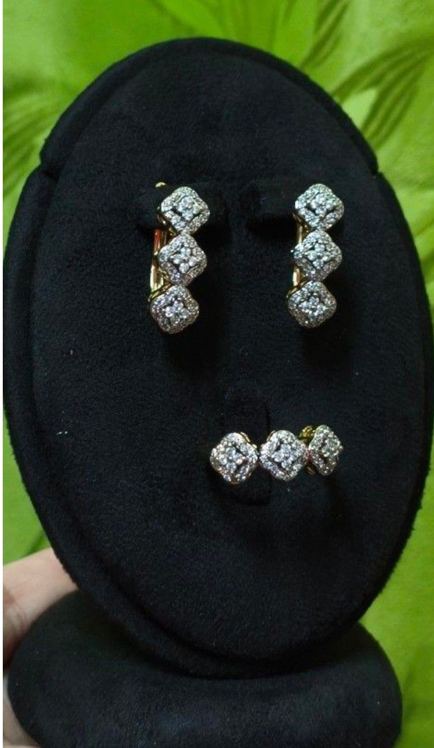 Earrings and Ring Size 7 Set non Tarnish (Category: Earrings) located in Quezon City. Submitted by gemaicloset (Listing ID 1462979520, Image 1). Description: - Beautiful diamond set - Includes a pair of earrings and a matching ring - Design: Three stacked square motifs, each encrusted with small diamonds - Perfect for special occasions or everyday wear.