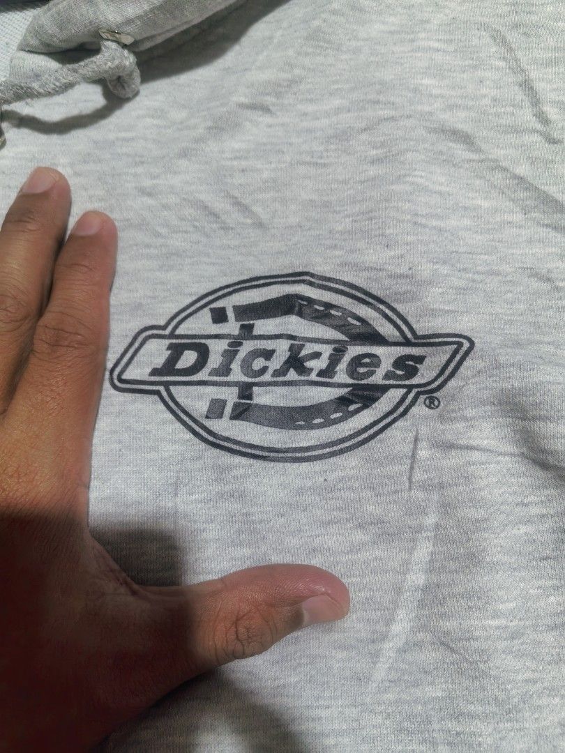 Dickies fullzip double patch hoodie (Category: Hoodies) located in Vinzons. Submitted by khasanche43622 (Listing ID 1463041521, Image 2). Description: Excellent condition No issue Double patch With sleeve script L-27 W-23.
