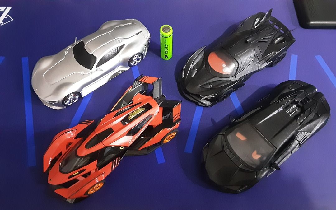 Diecast Hypercar/Supercar Set - 1/32 Scale (Category: Vehicle & Diecast Models) located in Quezon City. Submitted by bobbyrey1 (Listing ID 1462945467, Image 1). Description: Diecast Hypercar/Supercar Set - 1/32 Scale In 1/32 Scale (but mas malaki nang konti sa standard na 1/32) Set of 4. Lamborghini Revuelto (Electronic, with working lights and sound) Lamborghini V12 Vision GT (Electronic, with working lights and sound) Apollo EVO (Electronic, wi