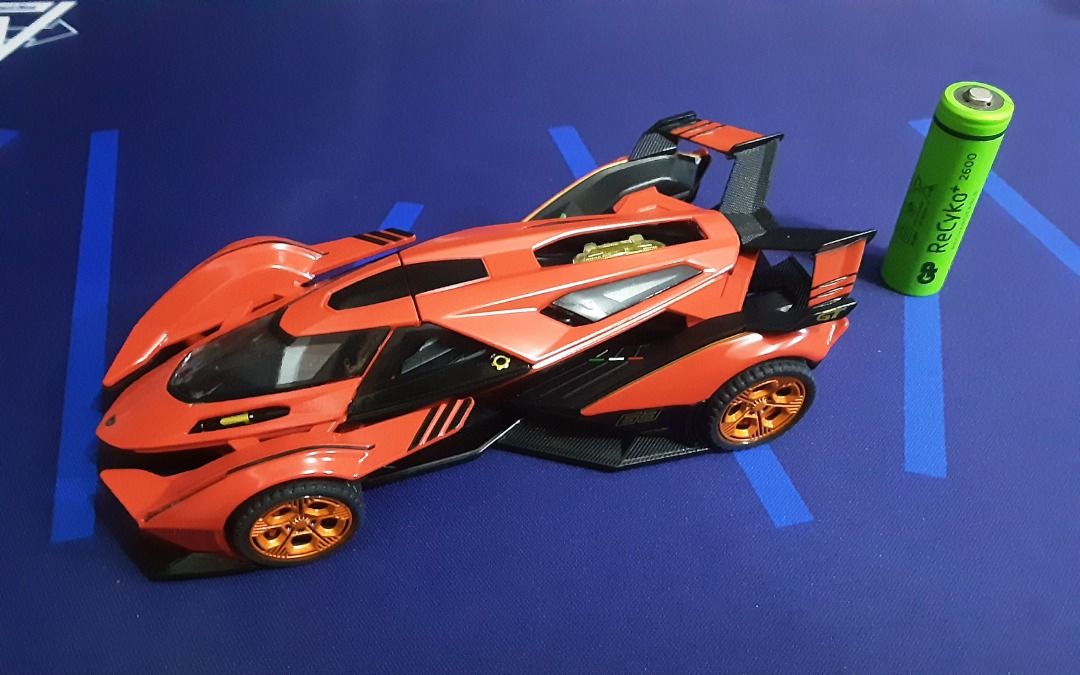Diecast Hypercar/Supercar Set - 1/32 Scale (Category: Vehicle & Diecast Models) located in Quezon City. Submitted by bobbyrey1 (Listing ID 1462945467, Image 3). Description: Diecast Hypercar/Supercar Set - 1/32 Scale In 1/32 Scale (but mas malaki nang konti sa standard na 1/32) Set of 4. Lamborghini Revuelto (Electronic, with working lights and sound) Lamborghini V12 Vision GT (Electronic, with working lights and sound) Apollo EVO (Electronic, wi