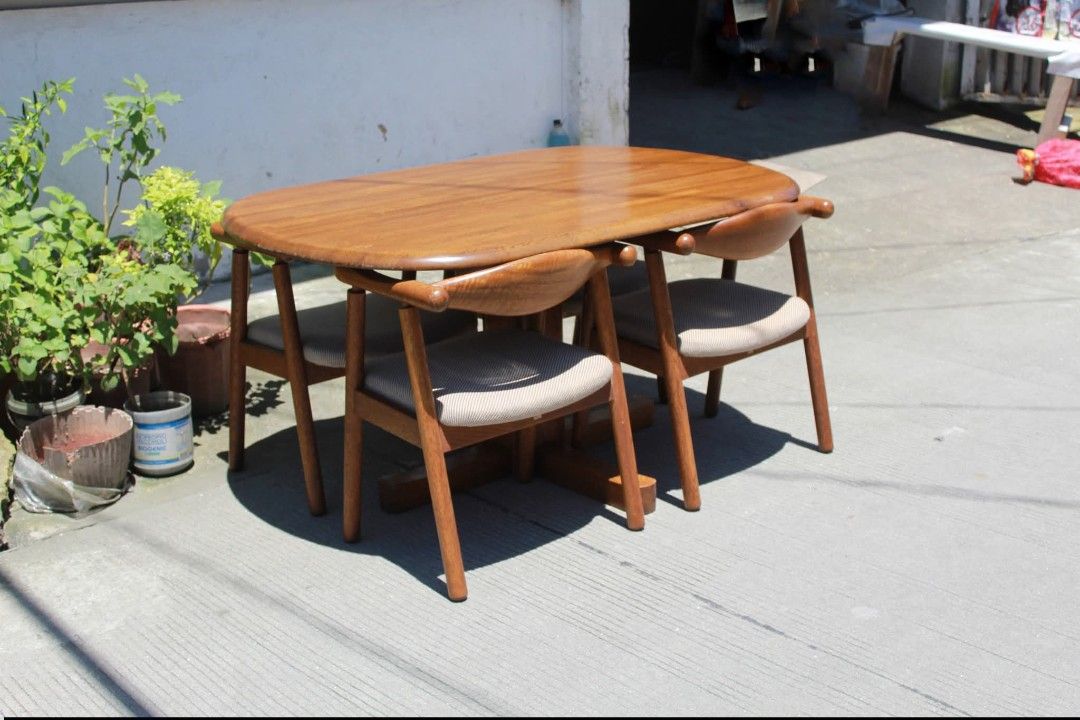 Dining Set (Category: Tables & Sets) located in Meycauayan. Submitted by marygracecasimiro (Listing ID 1462994378, Image 3). Description: NOBLE Mid-Century Modern Dining Set Rounded table and matching space-saving chairs that tuck neatly underneath. Designed with warm wood tones and comfortable fabric upholstered seats. Perfect for dining areas, condos or compact spaces Table size L:53 ¼ • W:36 • H:26 ¾ Chairs size L:21 • W:18 • Seat H:15 ½ • Bac