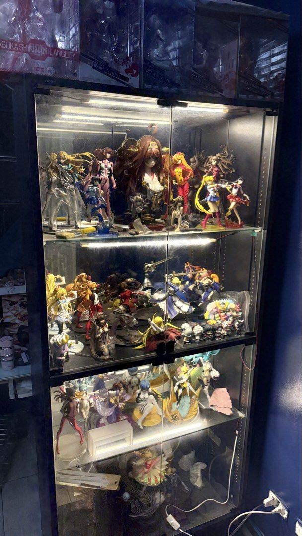 Display Glass Cabinet with Back Mirror (Category: Shelves, Cabinets & Racks) located in Manila. Submitted by blueseamarketing (Listing ID 1463039298, Image 1). Description: Toys inside not included Mirror on the back (built in) 1st shelf - 40 cm tall (pinaka taas) 2nd - 41.5 cm tall 3rd - 34 cm tall 4th - 46.5 cm tall.