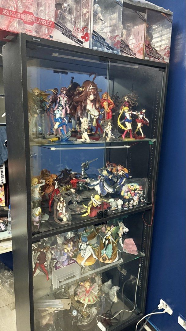Display Glass Cabinet with Back Mirror (Category: Shelves, Cabinets & Racks) located in Manila. Submitted by blueseamarketing (Listing ID 1463039298, Image 3). Description: Toys inside not included Mirror on the back (built in) 1st shelf - 40 cm tall (pinaka taas) 2nd - 41.5 cm tall 3rd - 34 cm tall 4th - 46.5 cm tall.