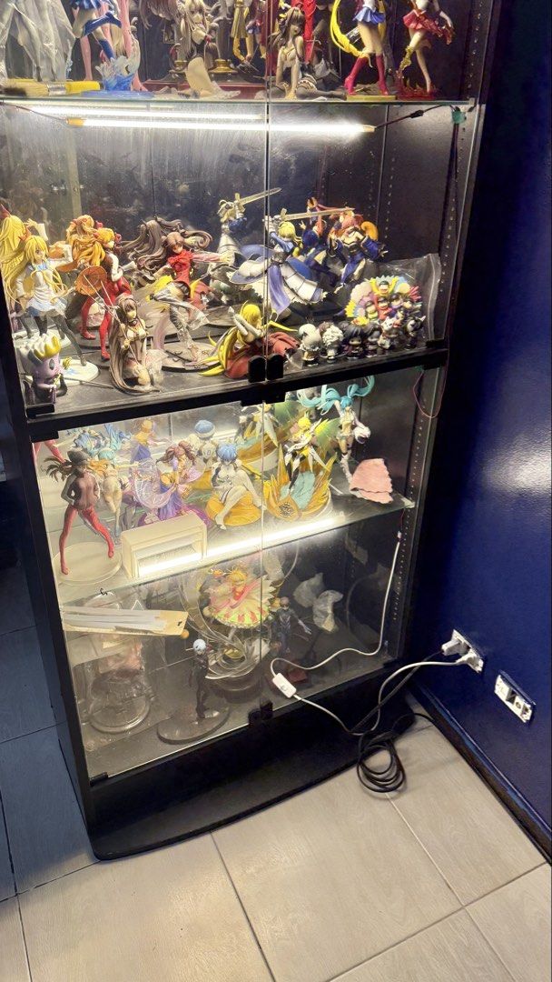 Display Glass Cabinet with Back Mirror (Category: Shelves, Cabinets & Racks) located in Manila. Submitted by blueseamarketing (Listing ID 1463039298, Image 2). Description: Toys inside not included Mirror on the back (built in) 1st shelf - 40 cm tall (pinaka taas) 2nd - 41.5 cm tall 3rd - 34 cm tall 4th - 46.5 cm tall.