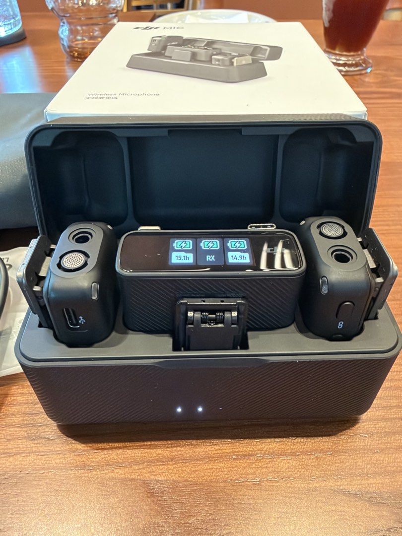 DJI Mic Wireless Microphone System with Charging Case (Category: Microphones) located in Manila. Submitted by ranulfovpayos.jr (Listing ID 1462967297, Image 1). Description: - DJI Mic wireless microphone system - Includes 2 transmitters and 1 receiver - Charging case displays battery life for each component - Comes with a storage pouch and charging cable - All original packaging included - Ideal for content creators.