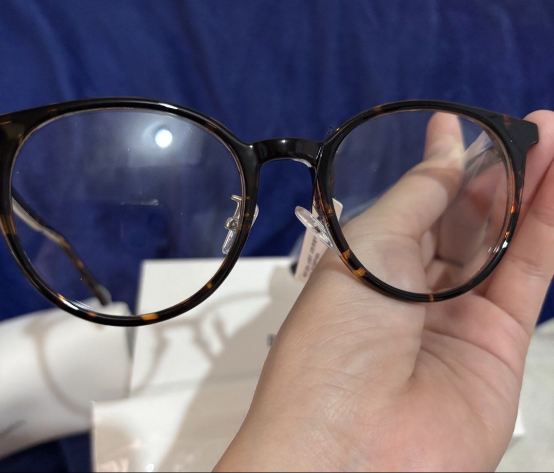 Double Lovers SORA Leopard Optical Glasses (Category: Sunglasses & Eyewear) located in Taytay. Submitted by cel127 (Listing ID 1462945146, Image 3). Description: - Brand: Double Lovers SORA - Style: Classic round optical frames - Design: Chic leopard print - Functionality: Ready for your prescription lenses - Condition: Comes with original case and packaging; never used just kept - Versatility: Ideal for daily wear or a fashion statement; origina
