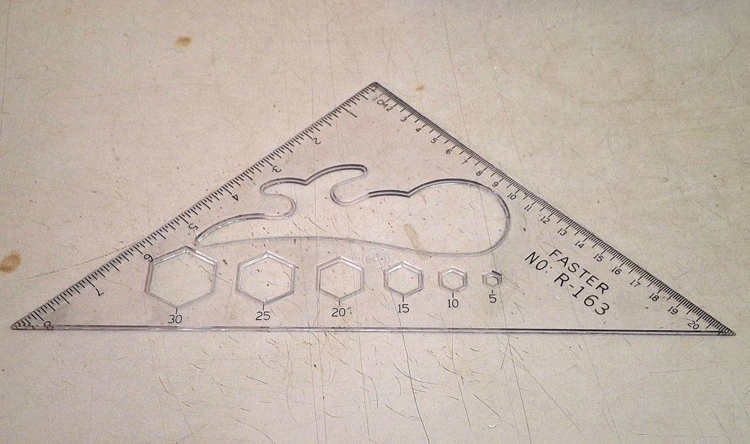 Drafting Triangle Ruler Set (Category: Stationery & School Supplies) located in Kuala Lumpur. Submitted by kyeewk_0820 (Listing ID 1462925412, Image 2). Description: - Set of 3 clear plastic drafting tools - Includes: protractor triangle, large triangle (with hexagon & flame cutouts), small triangle ruler - All tools feature clear measurement markings ⚠️ATTENTION ⚠️ The original packaging of the item is not available..