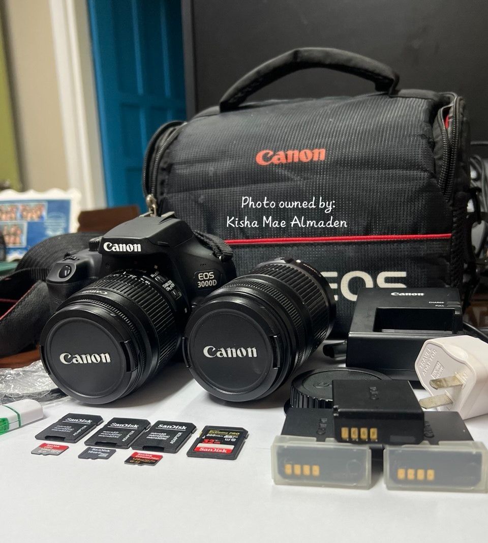 DSLR EOS CANON 3000D (Category: Cameras) located in Cebu City. Submitted by kishaalmaden8872 (Listing ID 1462990807, Image 1). Description: 📸 **CANON EOS 3000D CAMERA BUNDLE FOR SALE!** 🤍 Perfect for beginners, aspiring photographers, content creators, and travel memories! ✨ Selling **Canon EOS 3000D DSLR Camera with extra lens and accessories.** 📦 **INCLUSIONS:** ✅ Canon EOS 3000D Camera Body ✅ 1 Kit Lens ✅ 1 Extra Lens ✅ 3 Batteries ✅ 3 SD C