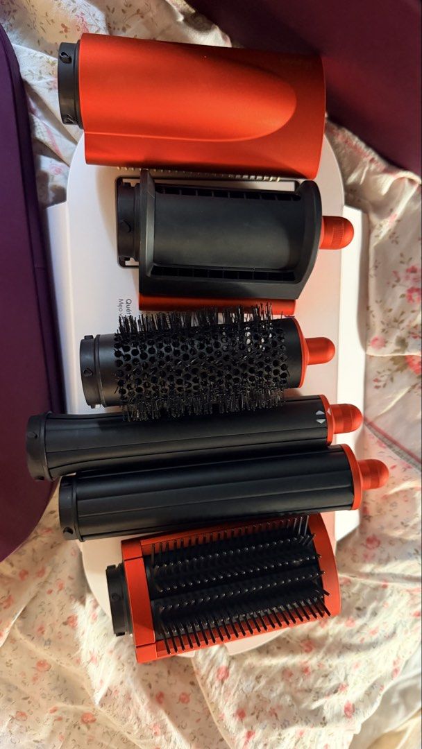Dyson Airwrap Complete Styler Red (Category: Hair) located in Rizal. Submitted by alexandra.07 (Listing ID 1462988405, Image 2). Description: ✨ Dyson Airwrap™ Multi-Styler |Red Orange ✨ ₱ 16,000 nego if sure buyer Complete Set Includes: * Dyson Airwrap™ Multi-Styler * Coanda smoothing dryer * 30mm Airwrap™ barrel * 40mm Airwrap™ barrel * Firm smoothing brush * Soft smoothing brush * Round volumizing brush * Filter cleaning brush * Presentation/st