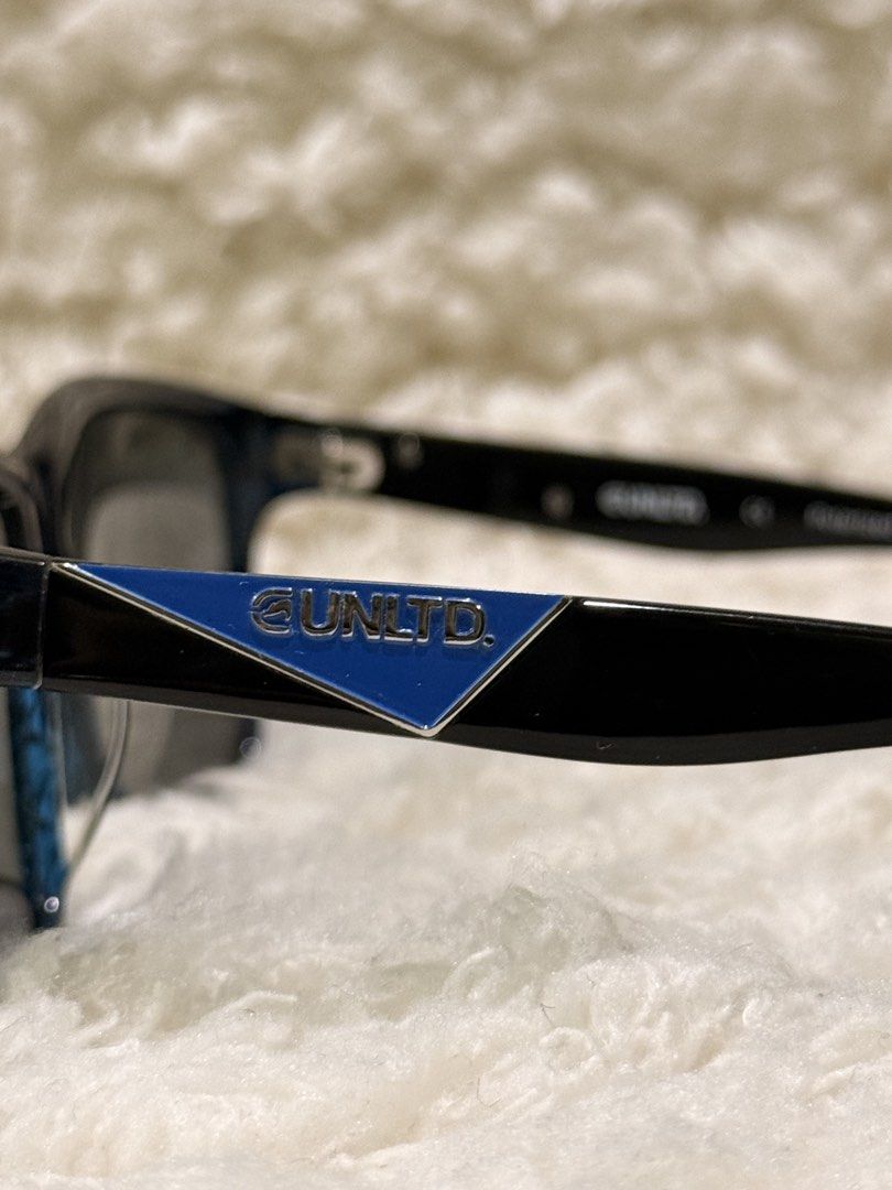 Ecko Unltd. EK-SUA0107PZ (Category: Sunglasses & Eyewear) located in Carmona. Submitted by ccdlrs (Listing ID 1463102136, Image 3). Description: - Brand: UNLTD. - Lens Color: Dark - Frame Accent Color: Blue - Includes: White UNLTD. case - Ideal for: Sunny days Size: 62 14 130 Little to few scratches Rfs: declutter.