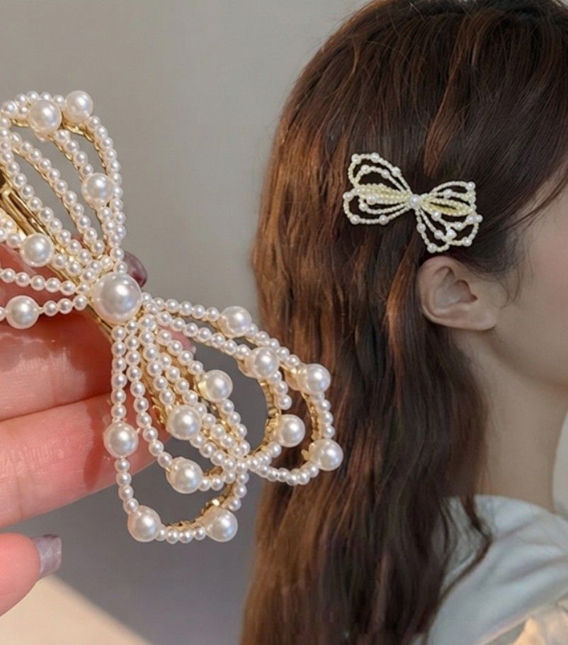 Elegant Gold Pearl Clip (Category: Hair Accessories) located in Bocaue. Submitted by jessdcluters (Listing ID 1463096551, Image 1). Description: .