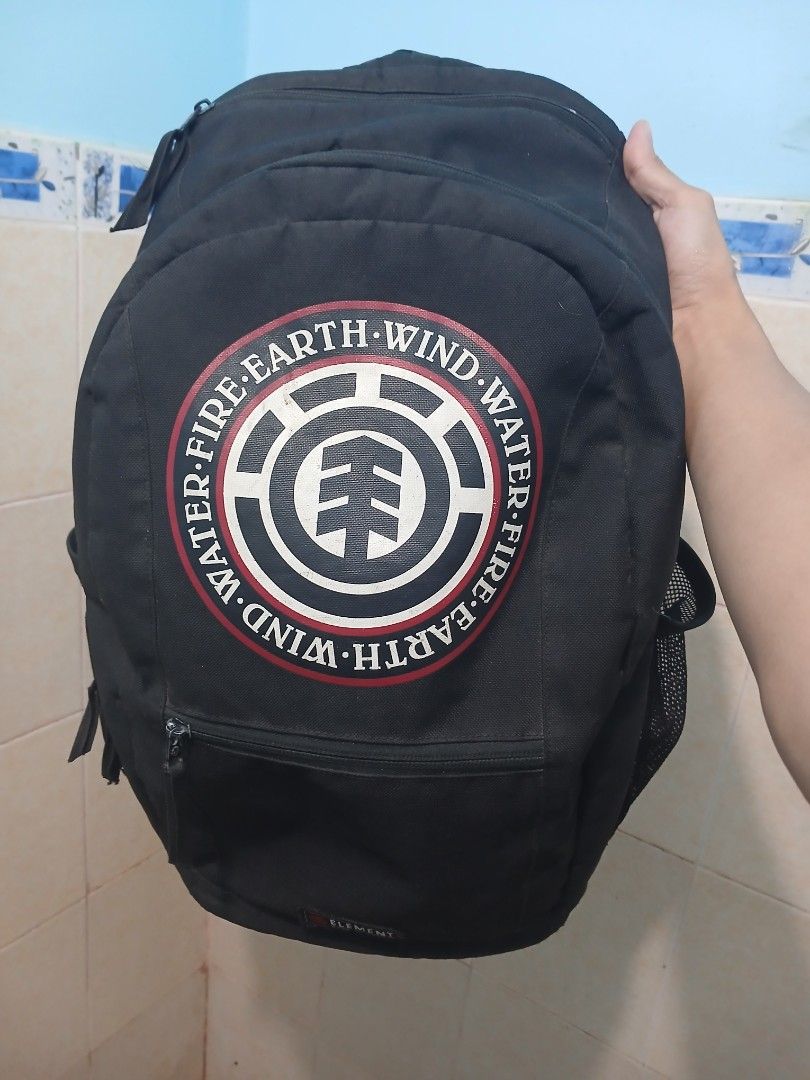Element Backpack Water Fire Wind Earth (Category: Backpacks) located in Manila. Submitted by penoise9 (Listing ID 1462965635, Image 1). Description: - Classic black Element backpack - Features iconic Water-Fire-Wind-Earth logo - Multiple zippered compartments for organization - Internal laptop sleeve - Durable design, built to last - Ideal for school, work, or everyday adventures.