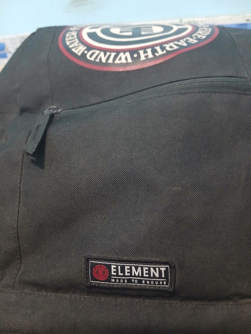 Element Backpack Water Fire Wind Earth (Category: Backpacks) located in Manila. Submitted by penoise9 (Listing ID 1462965635, Image 2). Description: - Classic black Element backpack - Features iconic Water-Fire-Wind-Earth logo - Multiple zippered compartments for organization - Internal laptop sleeve - Durable design, built to last - Ideal for school, work, or everyday adventures.