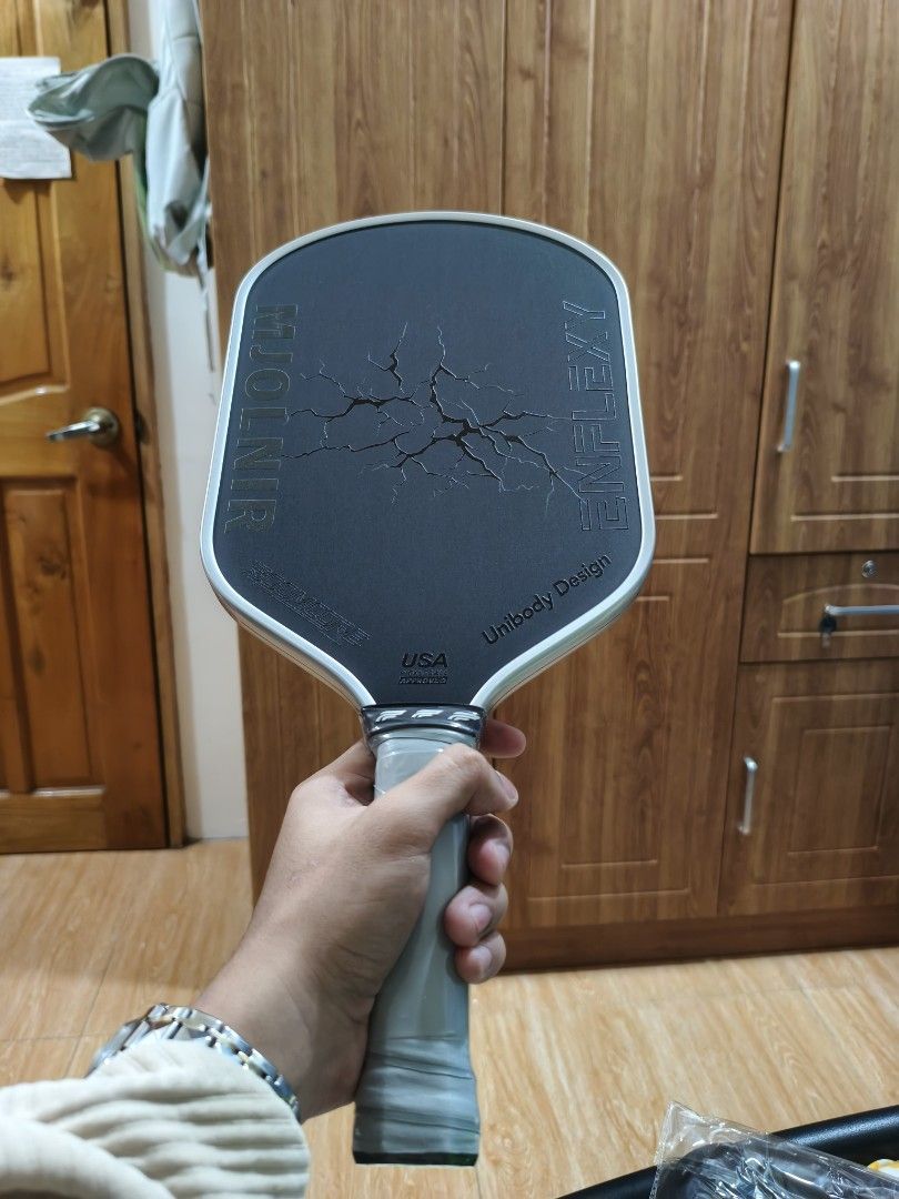 Enflexy Mjolnir PickleBall Paddle (Category: Racket and Ball Sports) located in Dipolog. Submitted by mxrks (Listing ID 1463014515, Image 2). Description: Complete Box, Used it only for 2 months. Has no scratches whatsoever because it has an edge guard put up since day 1 after purchase. Negotiable to an extent.