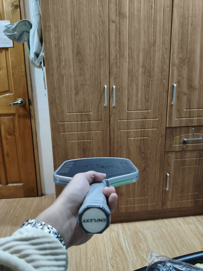 Enflexy Mjolnir PickleBall Paddle (Category: Racket and Ball Sports) located in Dipolog. Submitted by mxrks (Listing ID 1463014515, Image 3). Description: Complete Box, Used it only for 2 months. Has no scratches whatsoever because it has an edge guard put up since day 1 after purchase. Negotiable to an extent.