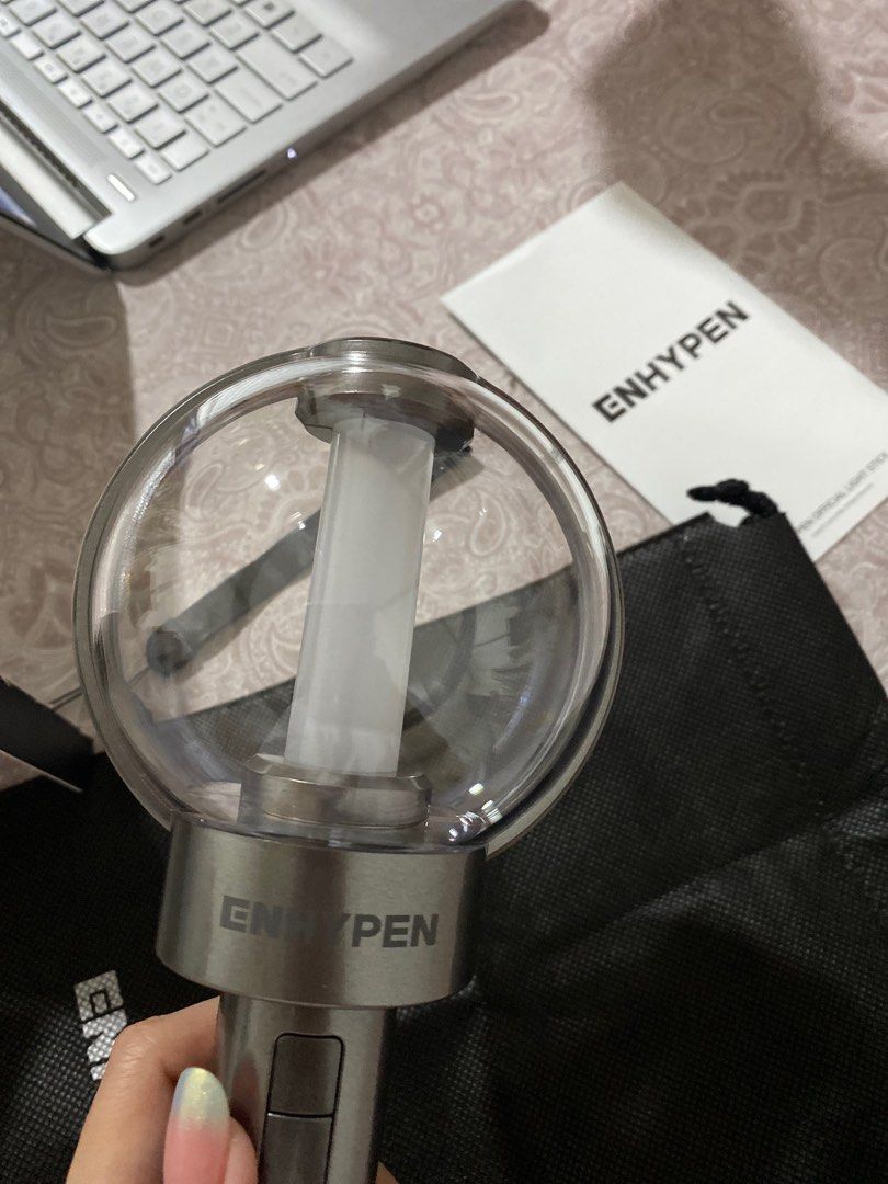 ENHYPEN Official Lightstick (Category: K-Wave Merchandise) located in Mariveles. Submitted by elicopter (Listing ID 1462912999, Image 2). Description: ENHYPEN official lightstick with box and strap. Good as new, used once only :) Will include freebies!! 🧡.