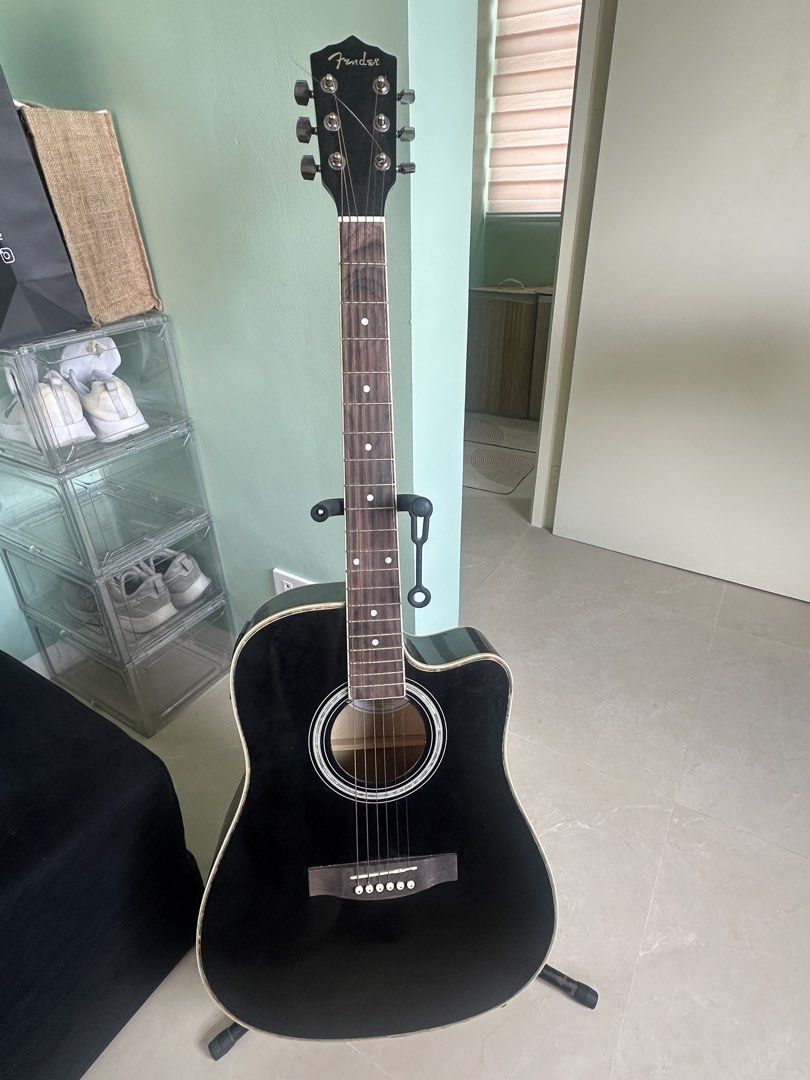 Fender Acoustic Guitar - Black (with pick up) (Category: Musical Instruments) located in Caloocan City. Submitted by anye.yen (Listing ID 1462955111, Image 1). Description: - Black Fender acoustic guitar - with pick up - Cutaway body style - 6 strings - Ideal for beginners and experienced players - Ready for strumming.