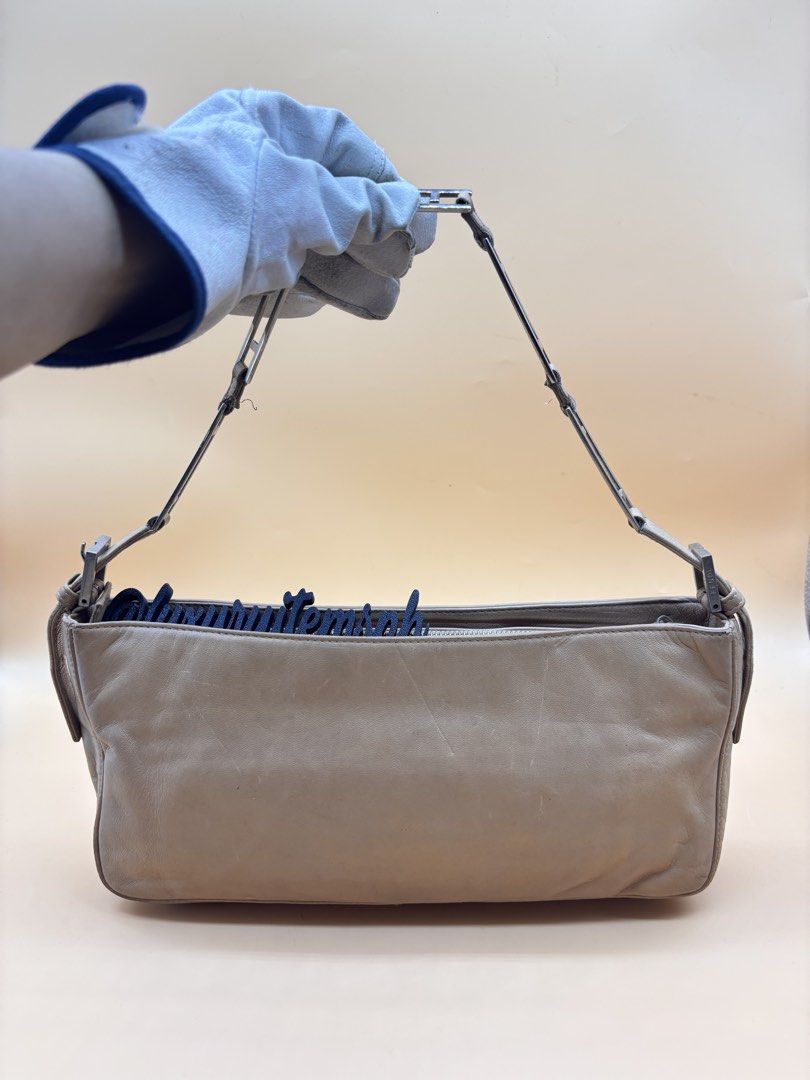 Fendi soft leather Baguette (Category: Luxury Bags & Wallets) located in Pamplona. Submitted by luxuryitems_ph (Listing ID 1462993546, Image 1). Description: - Classic tan leather shoulder bag - Simple and timeless design - Secure zip closure - Adjustable strap with buckle for customized fit - Ideal for everyday use - Minimalist aesthetic.