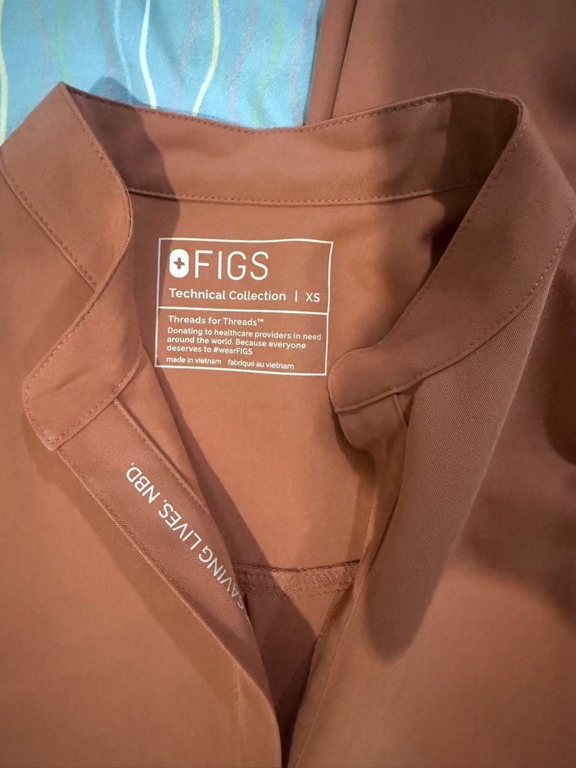 FIGS Scrub Top & Pants - Terracotta (Category: Activewear) located in Quezon City. Submitted by francfgr (Listing ID 1463051941, Image 3). Description: - FIGS scrub set - Color: Terracotta/Burnt Orange - Includes: Sleeveless top (Size XS) and Basic Pants (Size S) - Never worn - RFS: wrong size .
