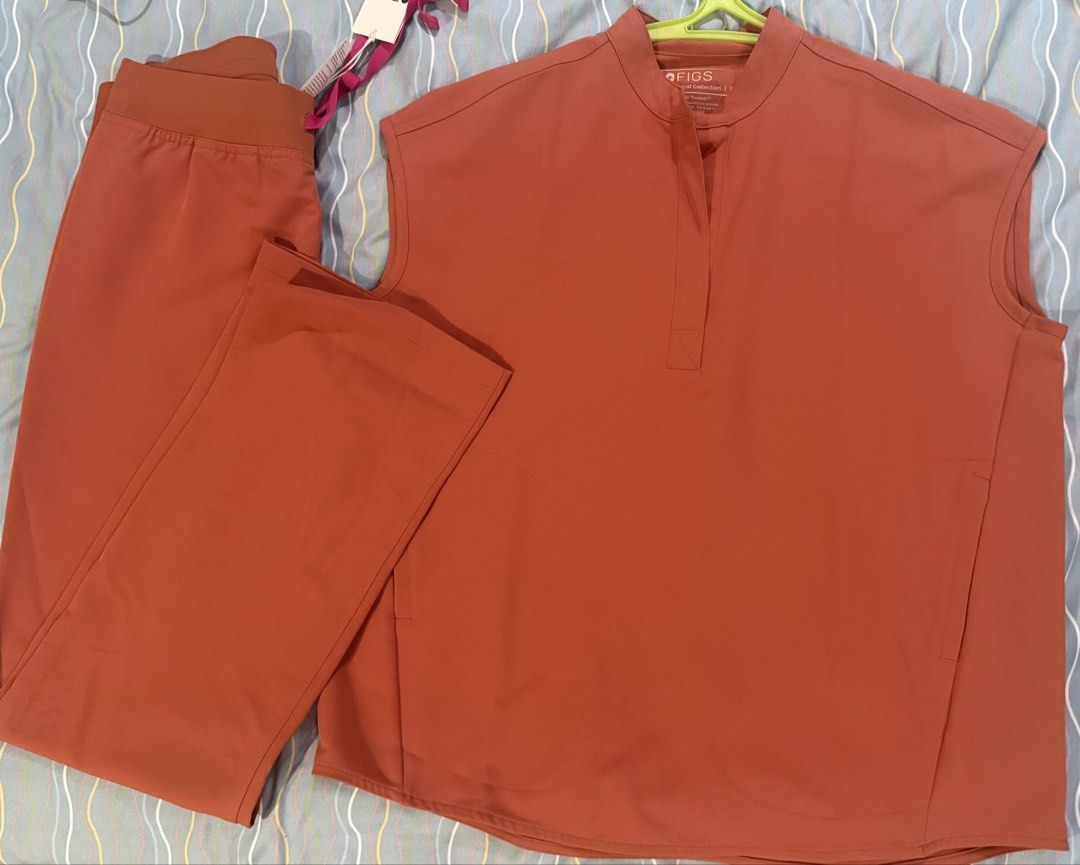 FIGS Scrub Top & Pants - Terracotta (Category: Activewear) located in Quezon City. Submitted by francfgr (Listing ID 1463051941, Image 1). Description: - FIGS scrub set - Color: Terracotta/Burnt Orange - Includes: Sleeveless top (Size XS) and Basic Pants (Size S) - Never worn - RFS: wrong size .