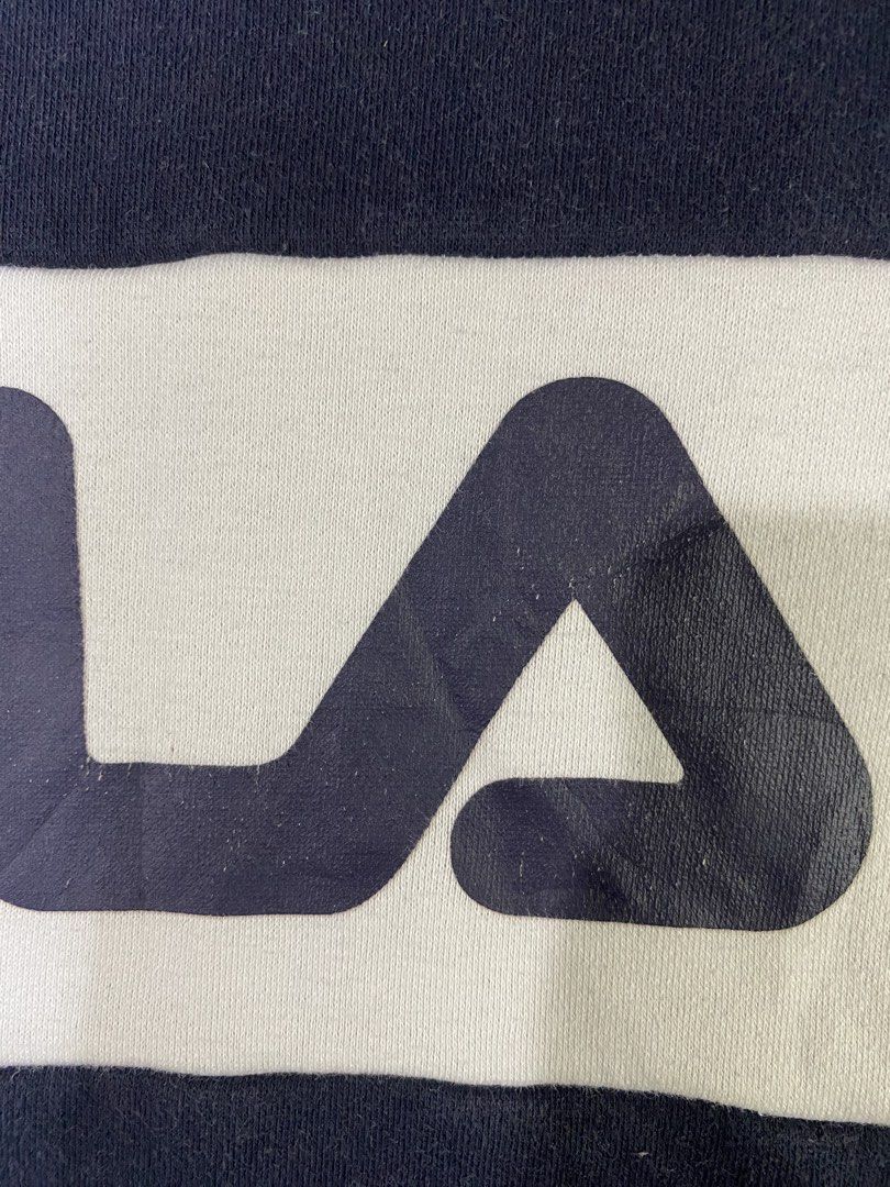 FILA (Category: Sets & Coordinates) located in General Santos City (Dadiangas). Submitted by nokkie_thrift (Listing ID 1463106613, Image 3). Description: FILA PULL OVER Good condition Dimes 21x27 Sleeve 25 Color rate 9/10 Issue : small crack print.