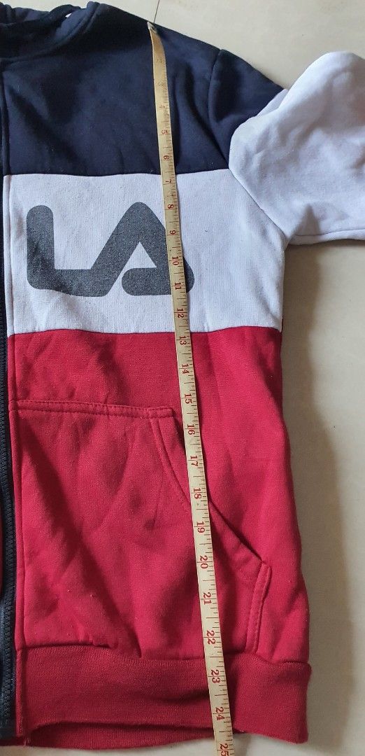 Fila Colorblock Zip-Up Jacket (Category: Coats, Jackets and Outerwear) located in Meycauayan. Submitted by shoptoown (Listing ID 1462947060, Image 3). Description: - Classic Fila colorblock jacket - Colors: Red, White, and Navy Blue - Full zip closure - Features pockets - Ideal for casual wear - Measurements: Length approx. 24 inches, Width approx. 20 inches.