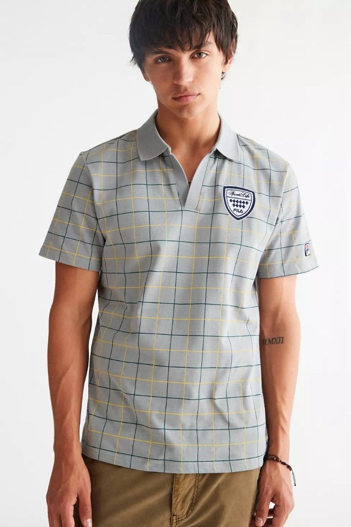 FILA Mand Polo Shirt (Category: Tshirts & Polo Shirts ) located in Manila. Submitted by elmer13leg56936 (Listing ID 1462893267, Image 1). Description: Excellent Condition Issue: Sign of usage Size: Large Dimes 21x27.