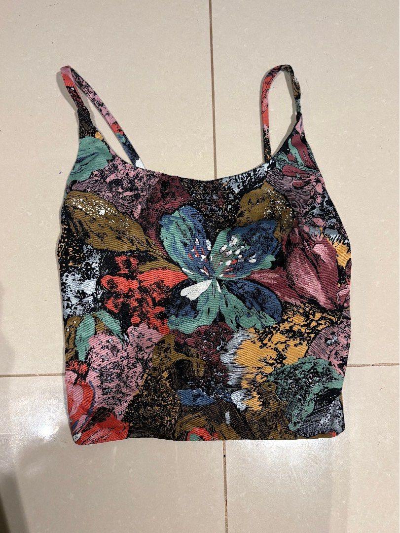 Floral Smocked Crop Top with Tie Straps (Category: Sleeveless) located in Cebu City. Submitted by chocolette.wearswhat (Listing ID 1462939813, Image 1). Description: ❗️lightly used ❗️no flaws - Funky floral print crop top - Smocked bust with tie-up straps - Pairs well with high-waisted jeans or skirts .