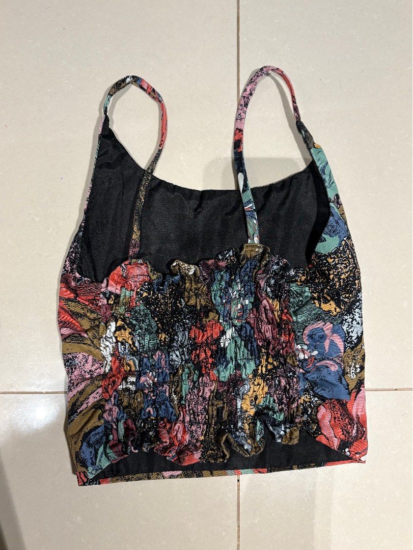 Floral Smocked Crop Top with Tie Straps (Category: Sleeveless) located in Cebu City. Submitted by chocolette.wearswhat (Listing ID 1462939813, Image 2). Description: ❗️lightly used ❗️no flaws - Funky floral print crop top - Smocked bust with tie-up straps - Pairs well with high-waisted jeans or skirts .