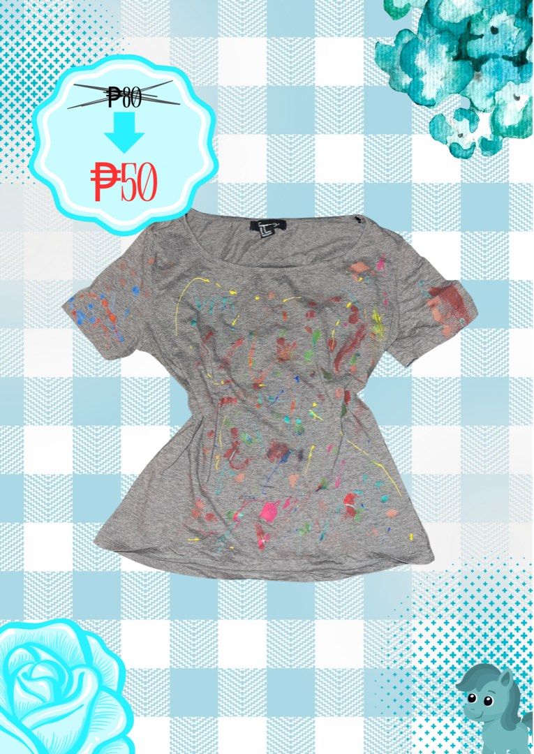 Forever 21 Grey Splatter Paint T-shirt (Category: Tshirts & Polo Shirts ) located in Tuguegarao City. Submitted by love_clothies (Listing ID 1463048607, Image 1). Description: - Grey t-shirt with vibrant, colorful paint splatters - Short sleeves and round neckline - Perfect for a casual, artsy, or fun vibe - Ideal for everyday wear or a night out.