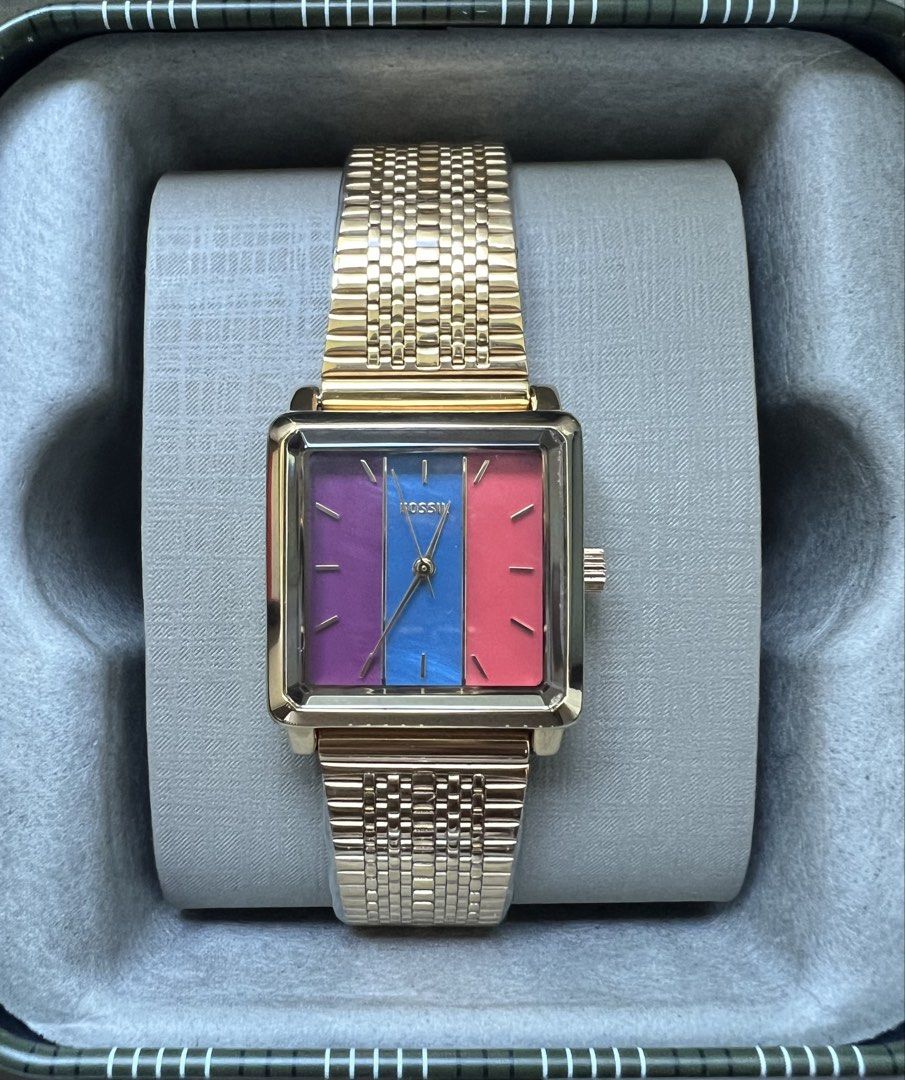 Fossil Julienne ES4807 (Category: Women's Watches) located in Paranaque City. Submitted by totiiiii (Listing ID 1462923080, Image 1). Description: Gold tone Fossil Julienne ES4807 - Unique square face with purple, blue, and pink/red colors - Comes with original box and manual Paranaque area. DM if interested..